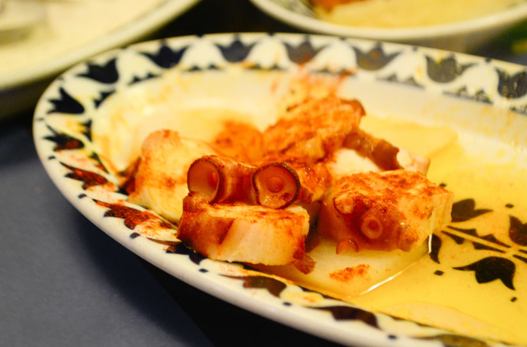 Barcelona Night Bike Tour with Local Tapas and Cava Stop