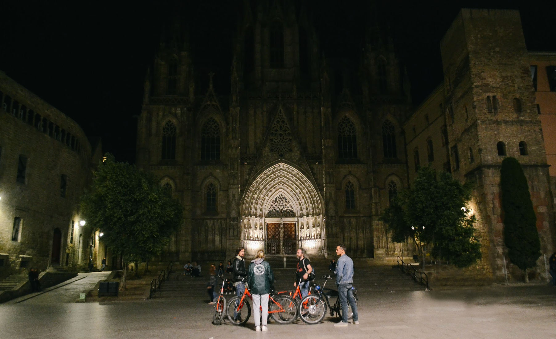 Barcelona Night Bike Tour with Local Tapas and Cava Stop