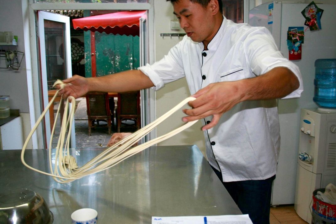 Cook with the Chef: Dumpling or Dim Sum Class from Scratch with Market Tour and Condiments class