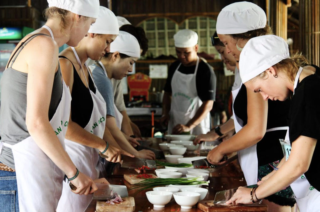 Eco-Friendly Vietnamese Cooking Class with Bamboo Boat and Market Tour