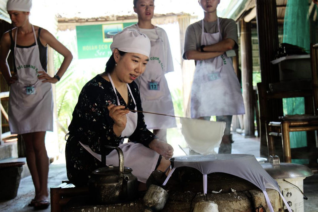 Eco-Friendly Vietnamese Cooking Class with Bamboo Boat and Market Tour