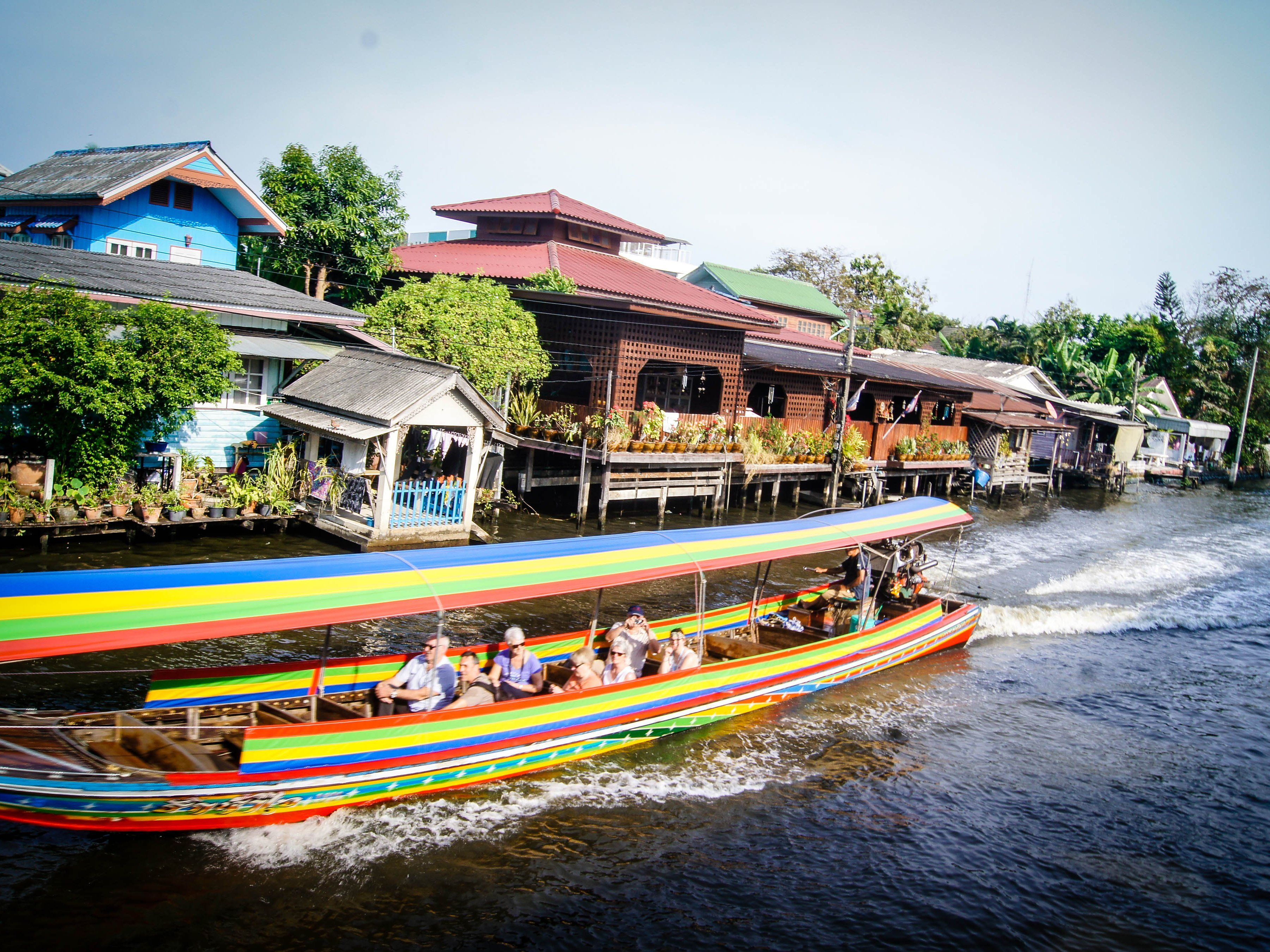 Discover Bangkok's Vibrant Markets: Food Tastings, Canal Tour & Cultural Heritage