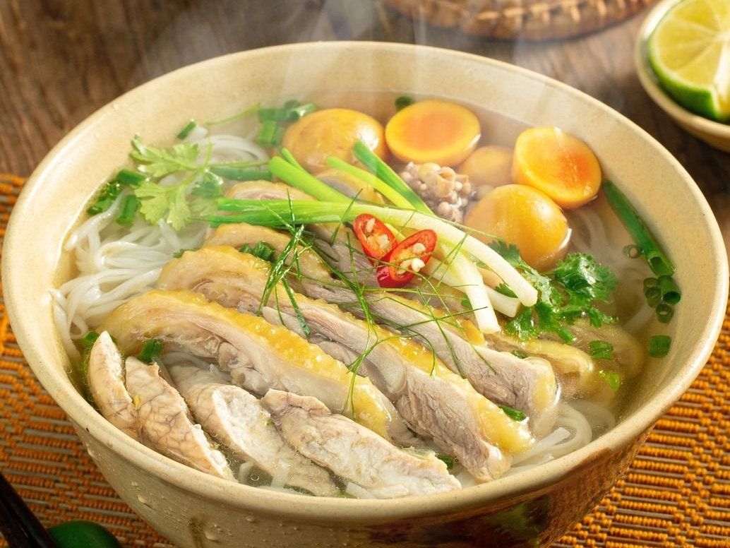 Hanoi by Night: Food, Culture and Flag Ceremony Experience