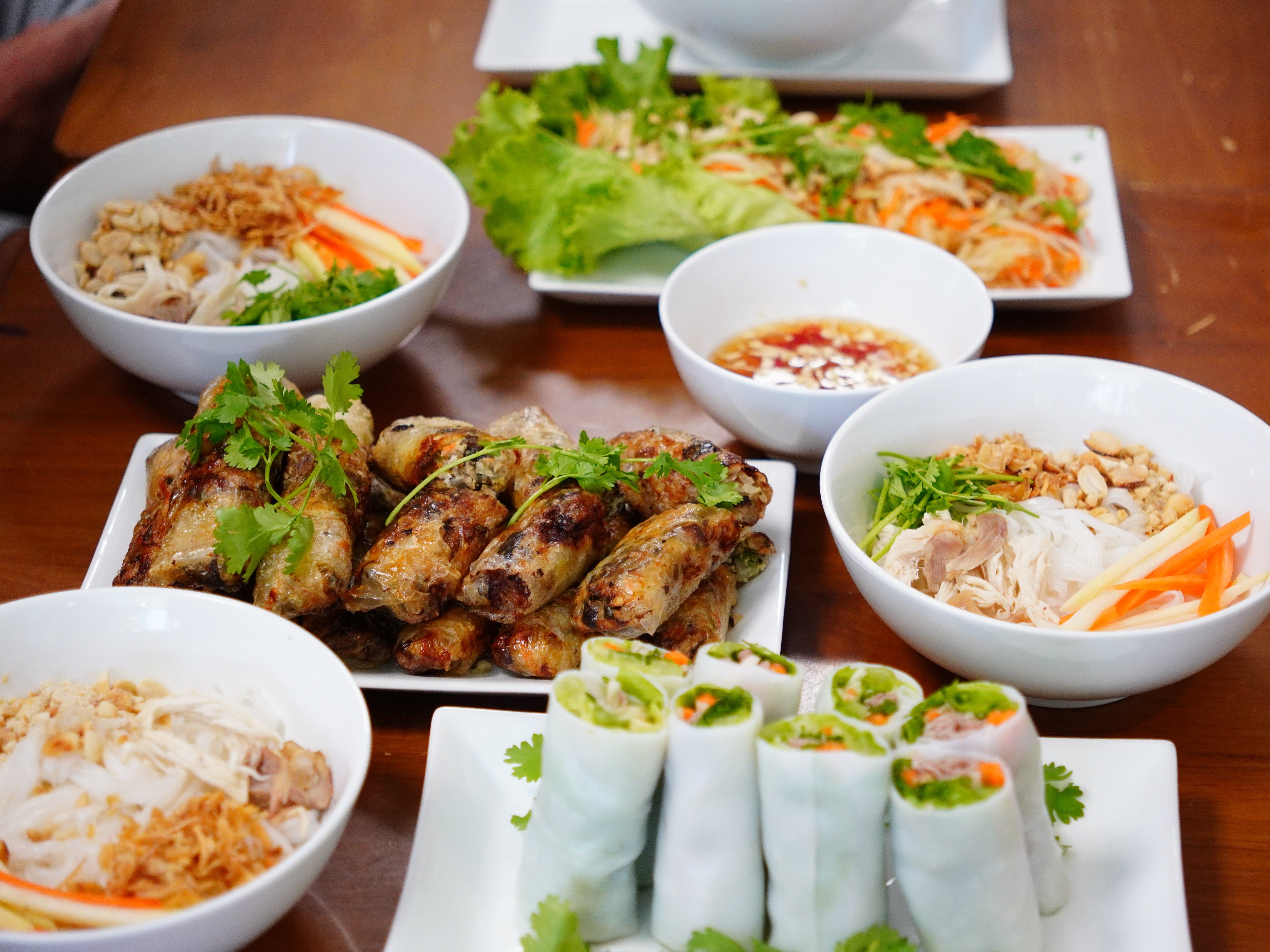 Discover Hanoi Cuisine: Maya Kitchen Cooking Class & Market Tour
