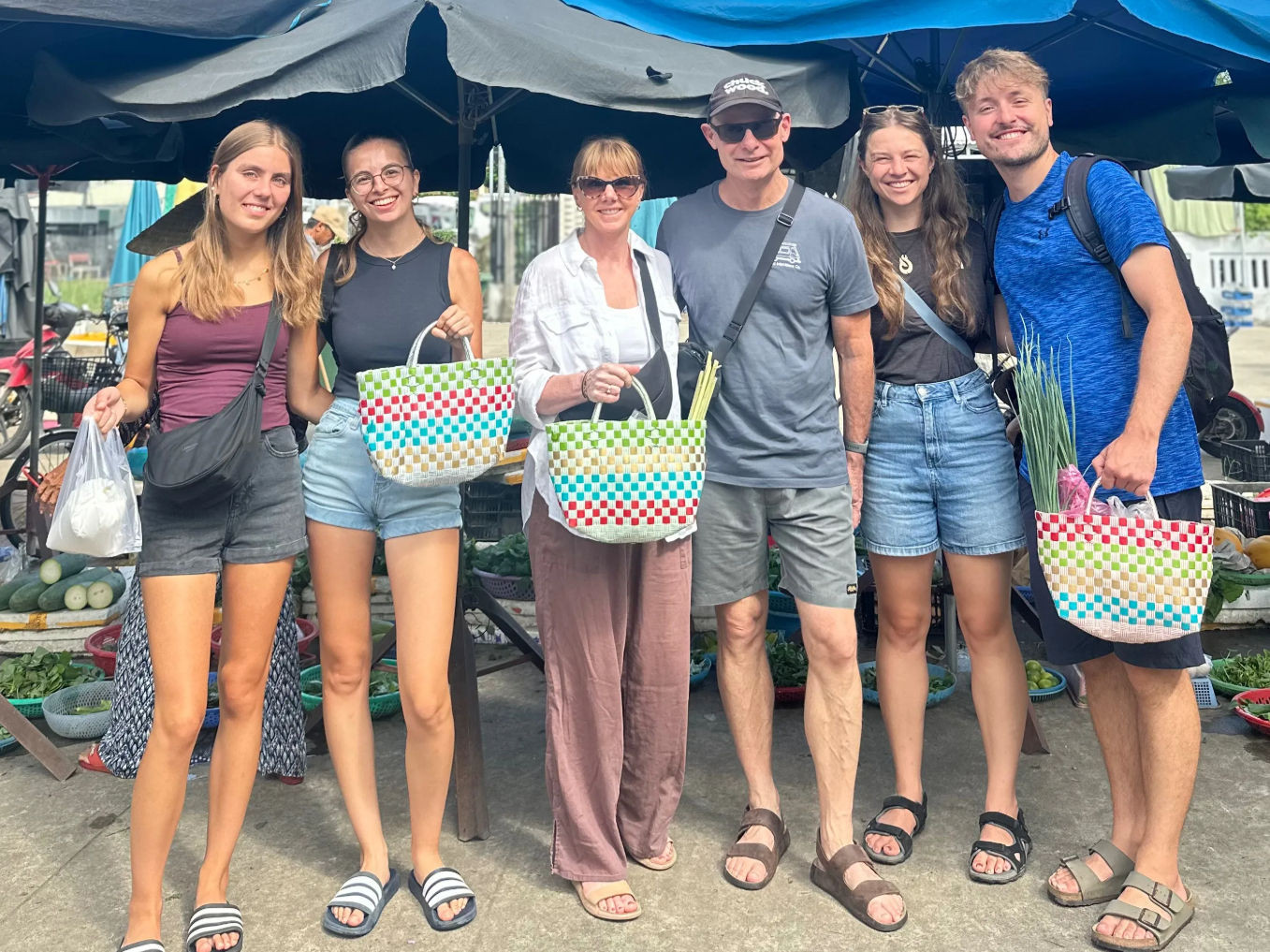 Hoi An Riverside Cooking Class with Market Tour, Basket Boat & Fishing