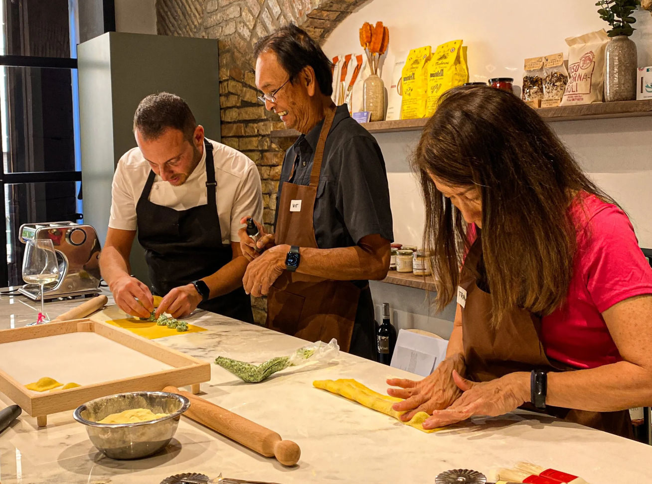 Italian Cooking Masterclass by the Colosseum: Pizza, Pasta & Tiramisu with Wine