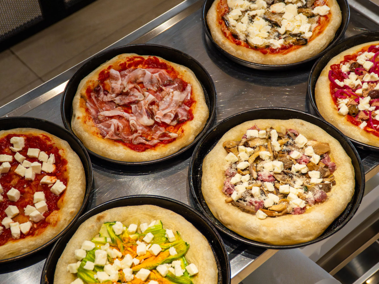 Italian Cooking Masterclass by the Colosseum: Pizza, Pasta & Tiramisu with Wine