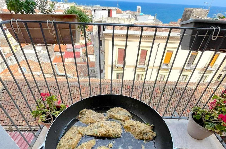 Join a Local for a Market Tour & Home Cooking Class in Catania