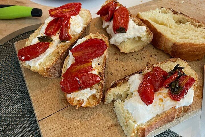 Join a Local for a Market Tour & Home Cooking Class in Catania