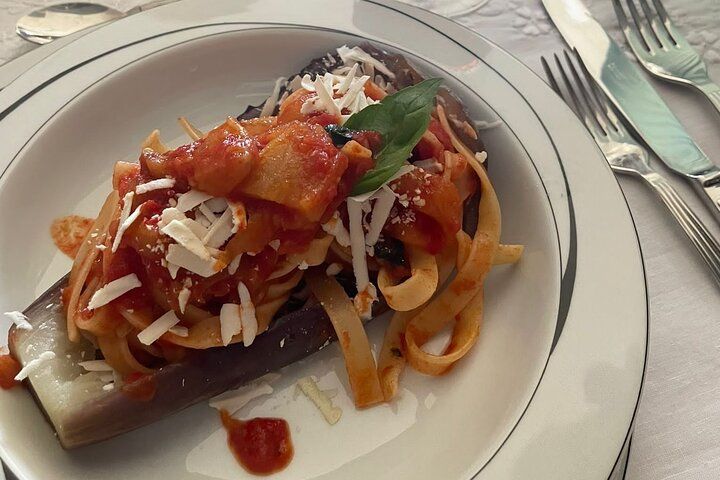 Join a Local for a Market Tour & Home Cooking Class in Catania