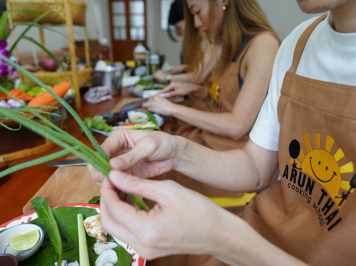 Goûtez à la Thaïlande : cours de cuisine en chinois, balade en tuk-tuk et visite du marché (offre d’ouverture)