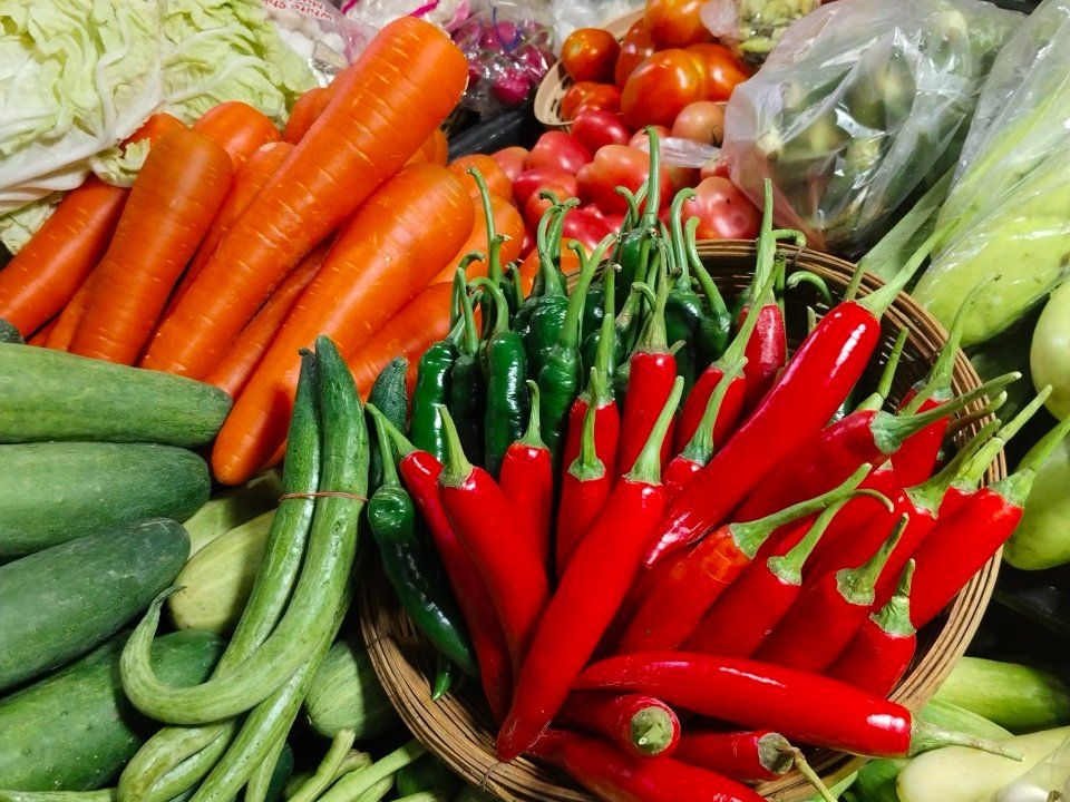 Goûtez à la Thaïlande : cours de cuisine en chinois, balade en tuk-tuk et visite du marché (offre d’ouverture)