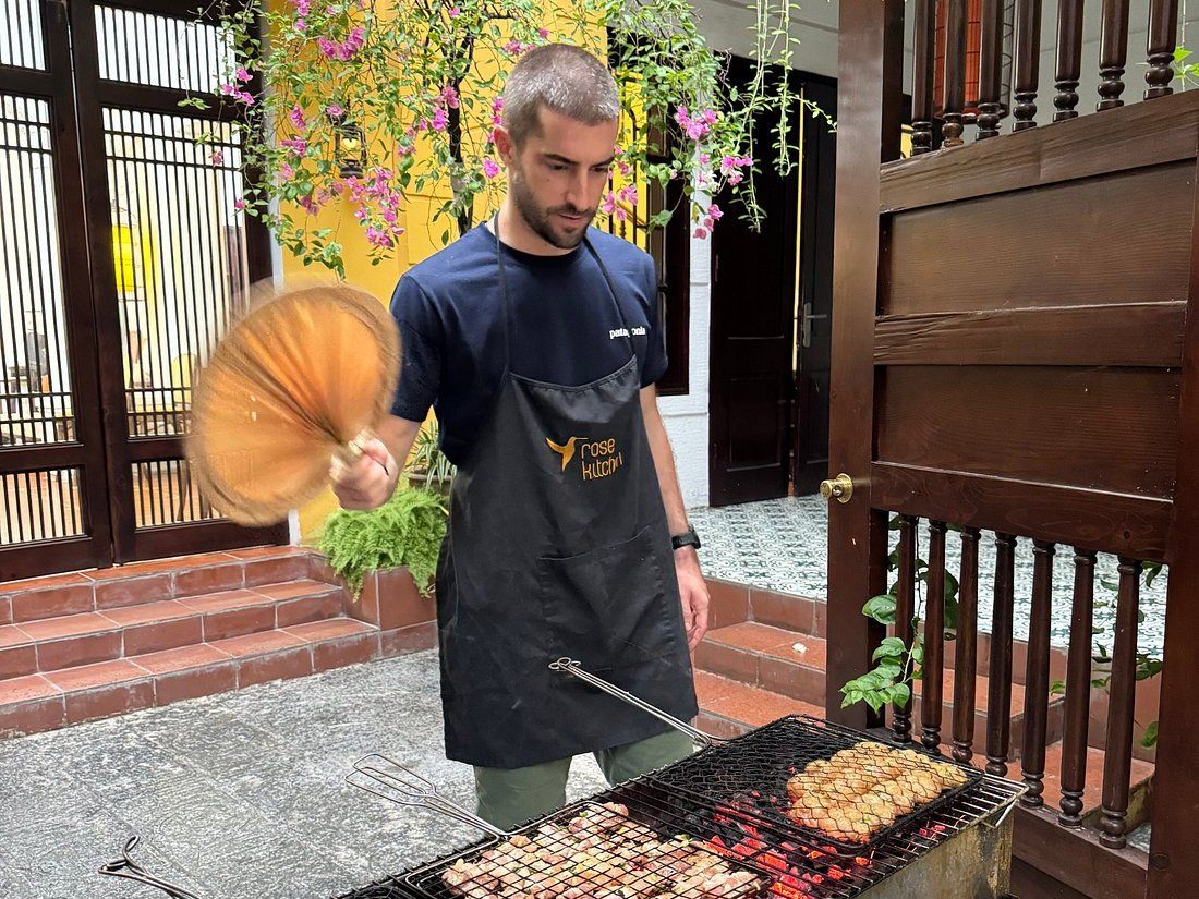 Relaxed Vietnamese Cooking Class with Market Tour and Homemade Wine Tasting