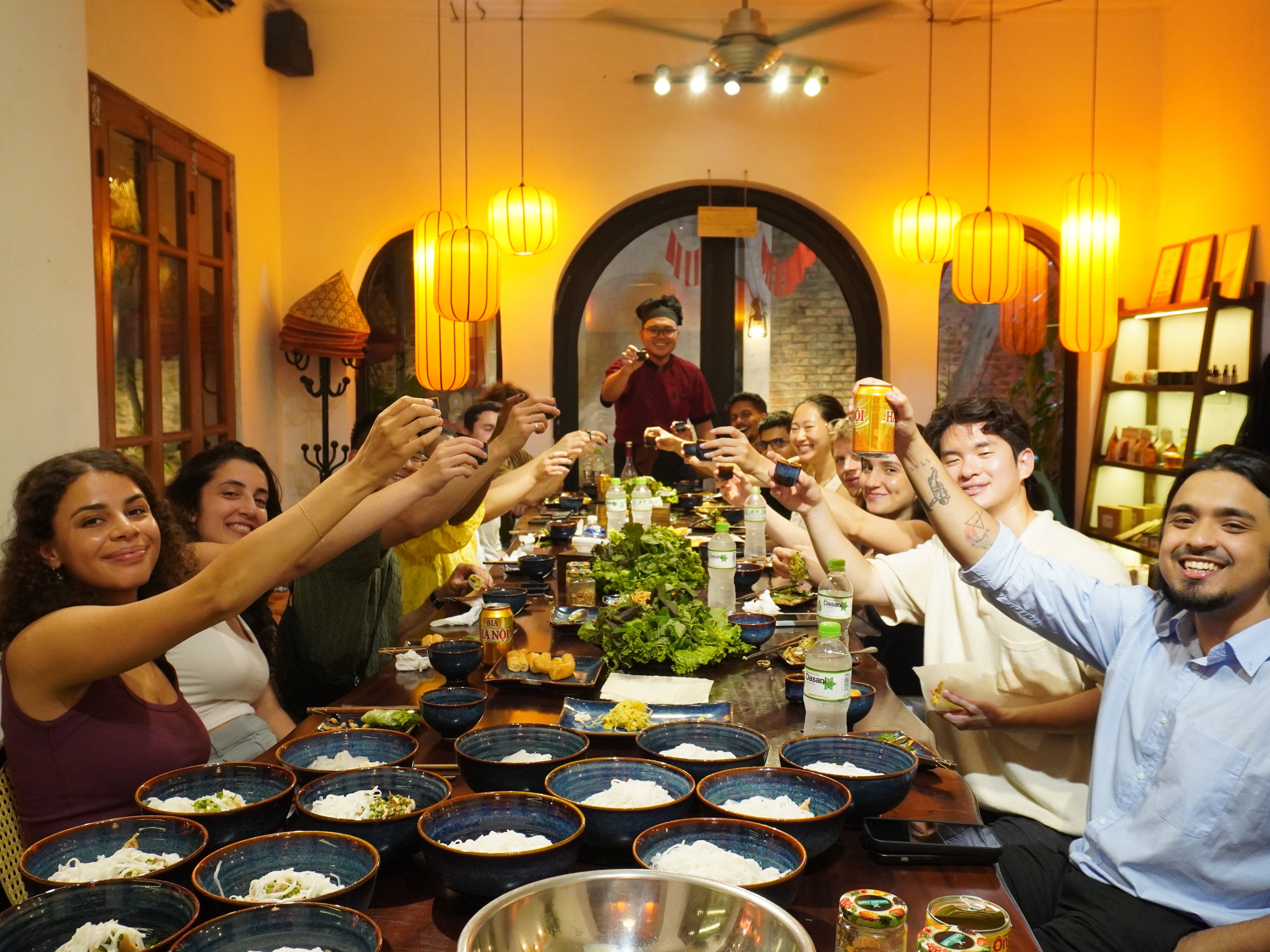 Relaxed Vietnamese Cooking Class with Market Tour and Homemade Wine Tasting
