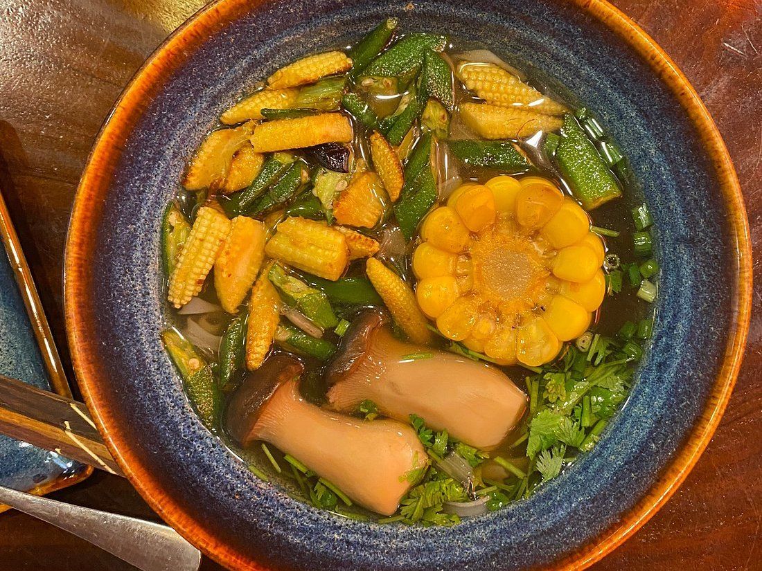 Relaxed Vietnamese Cooking Class with Market Tour and Homemade Wine Tasting