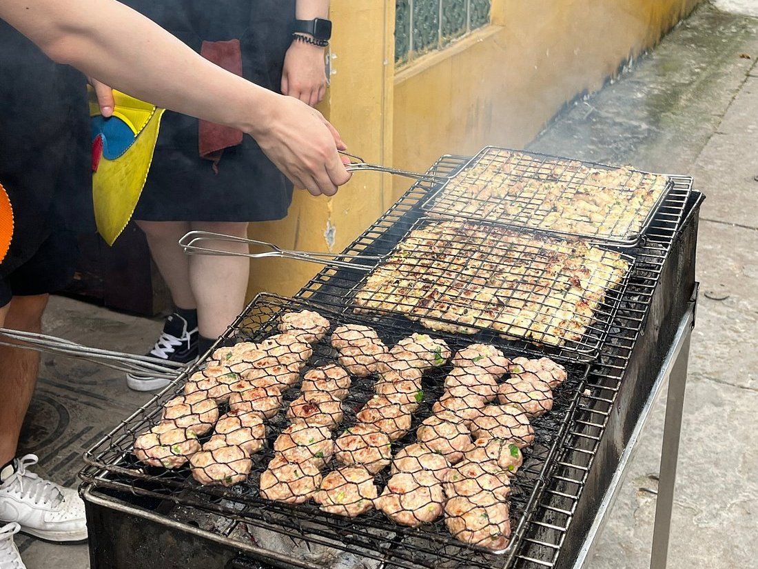 Relaxed Vietnamese Cooking Class with Market Tour and Homemade Wine Tasting