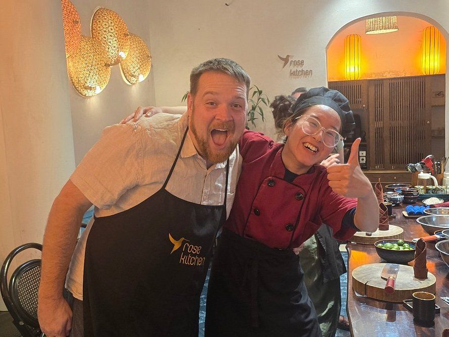 Relaxed Vietnamese Cooking Class with Market Tour and Homemade Wine Tasting