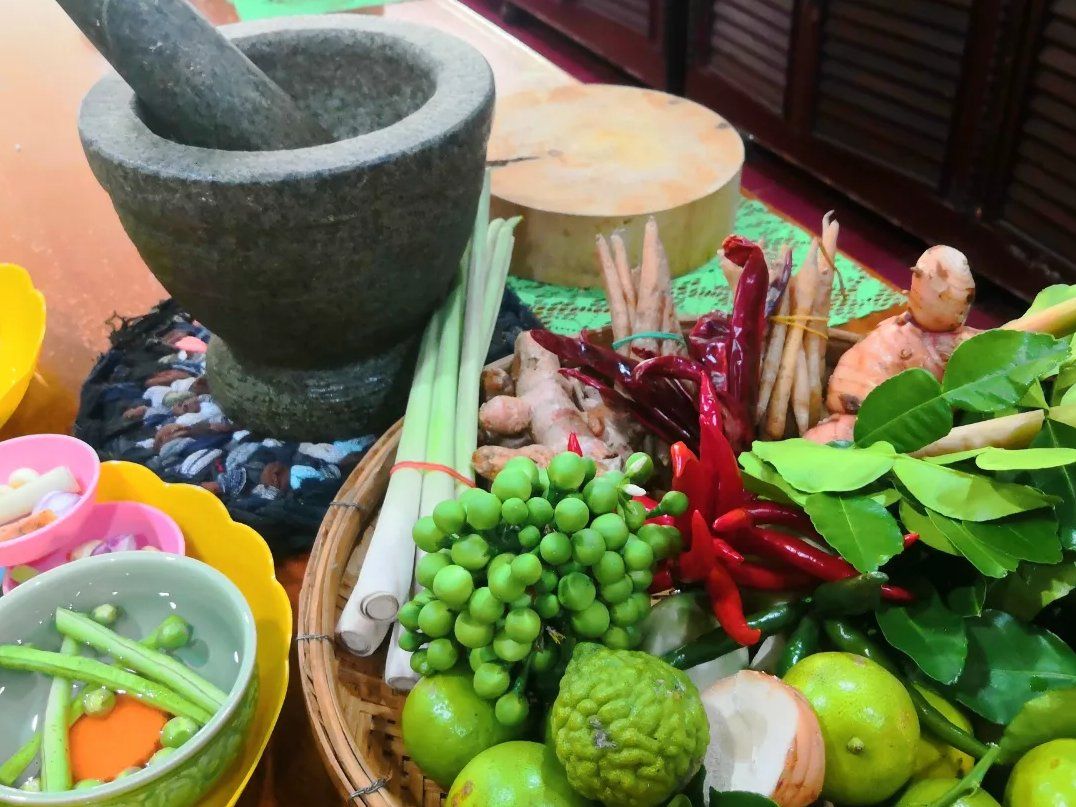 Discover the Secrets of Thai Cooking and have fun with a Market Tour