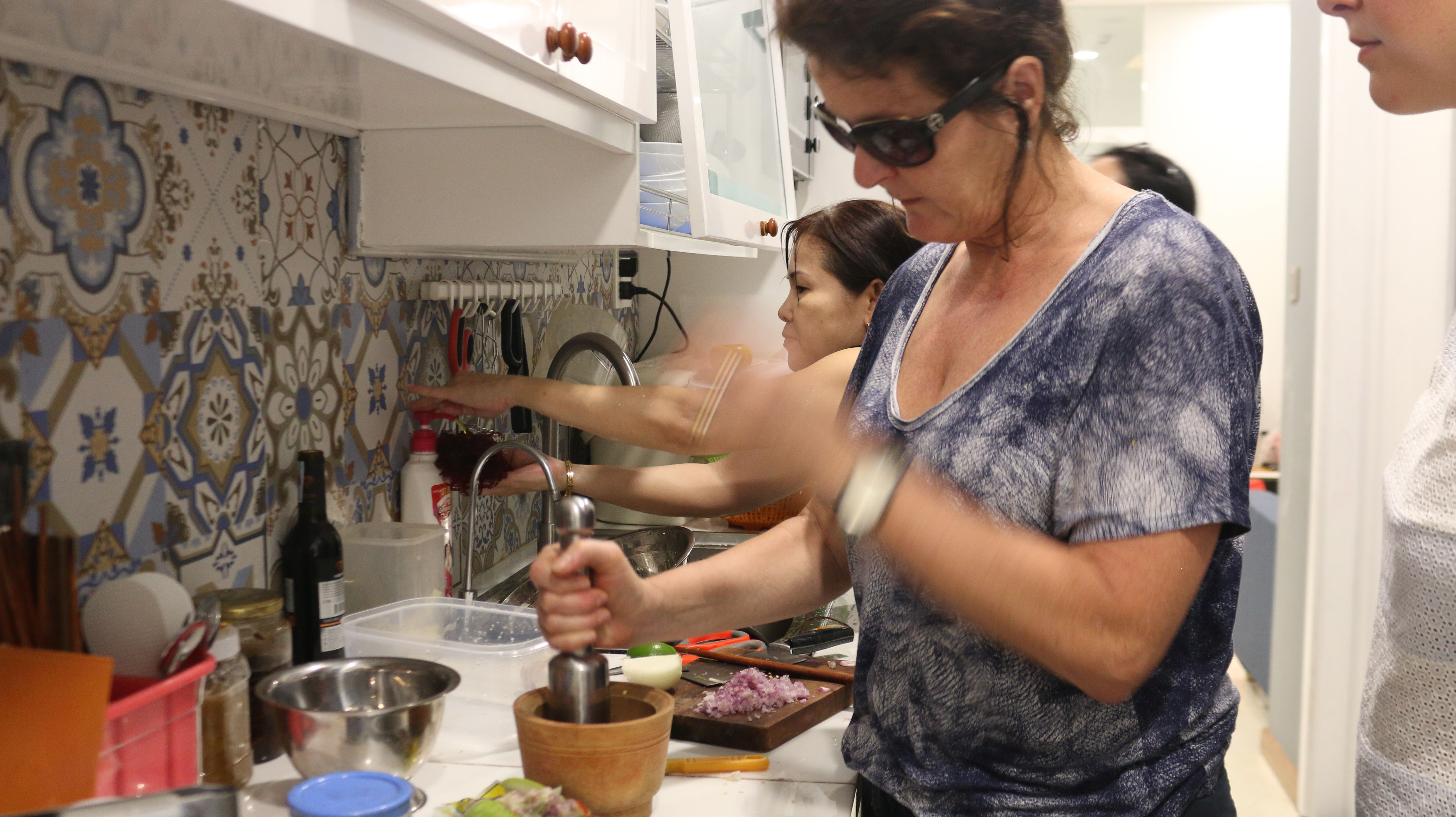 Hands on Cooking Class with Lily & Friends and Explore Local Neighborhoods