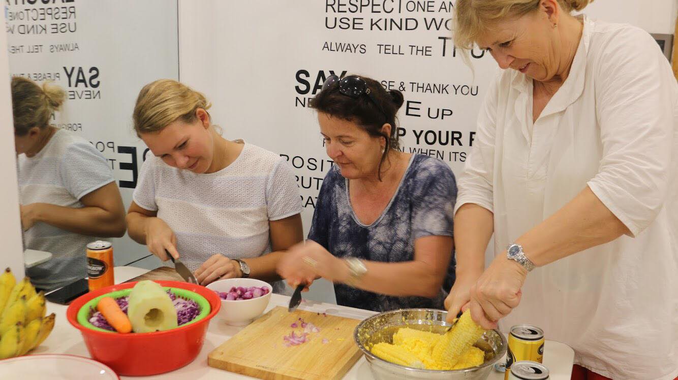 Hands on Cooking Class with Lily & Friends and Explore Local Neighborhoods