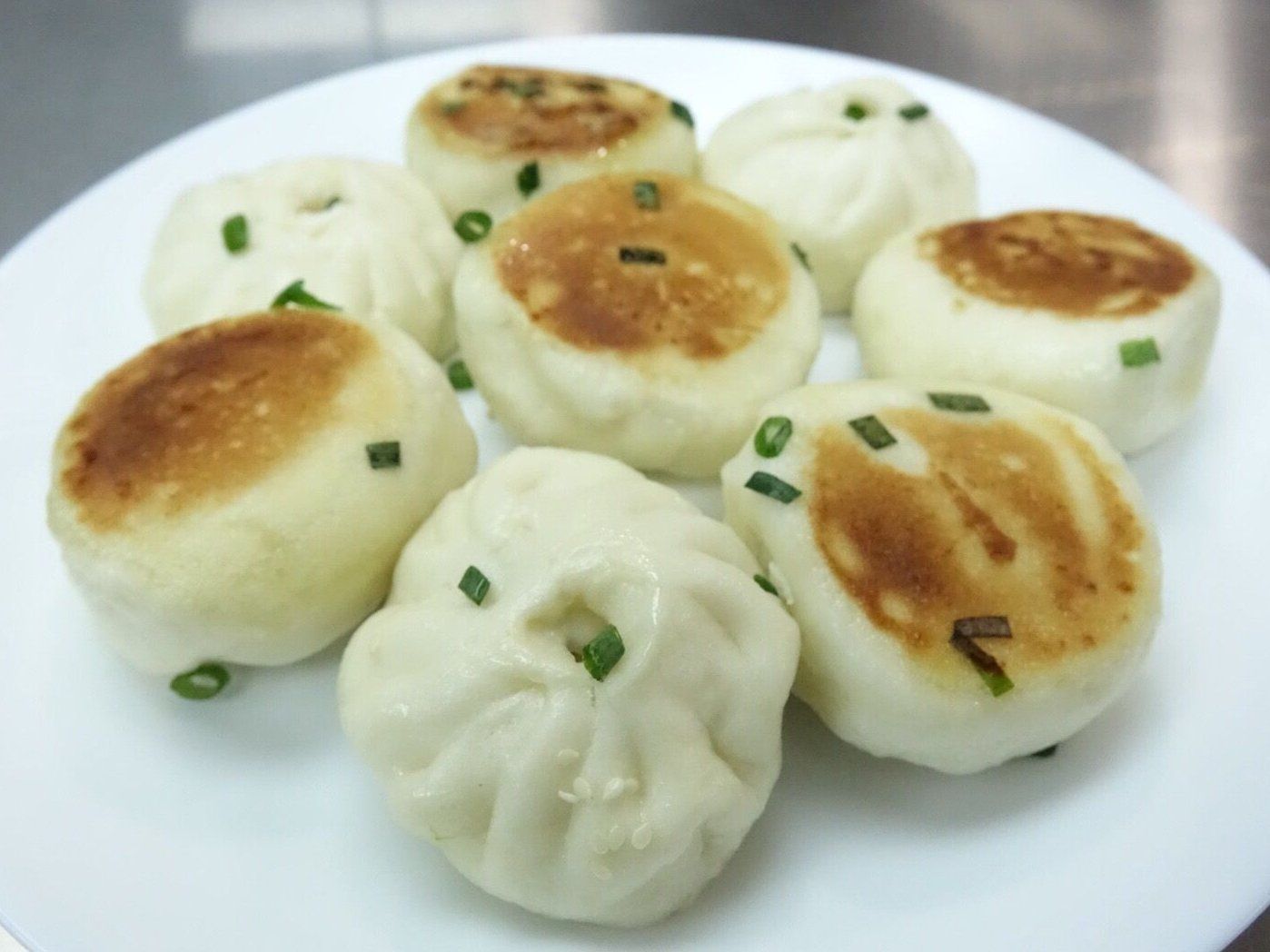 Traditional Chinese Steamed Bun with Pork Fillings and Homemade Barbeque Pork