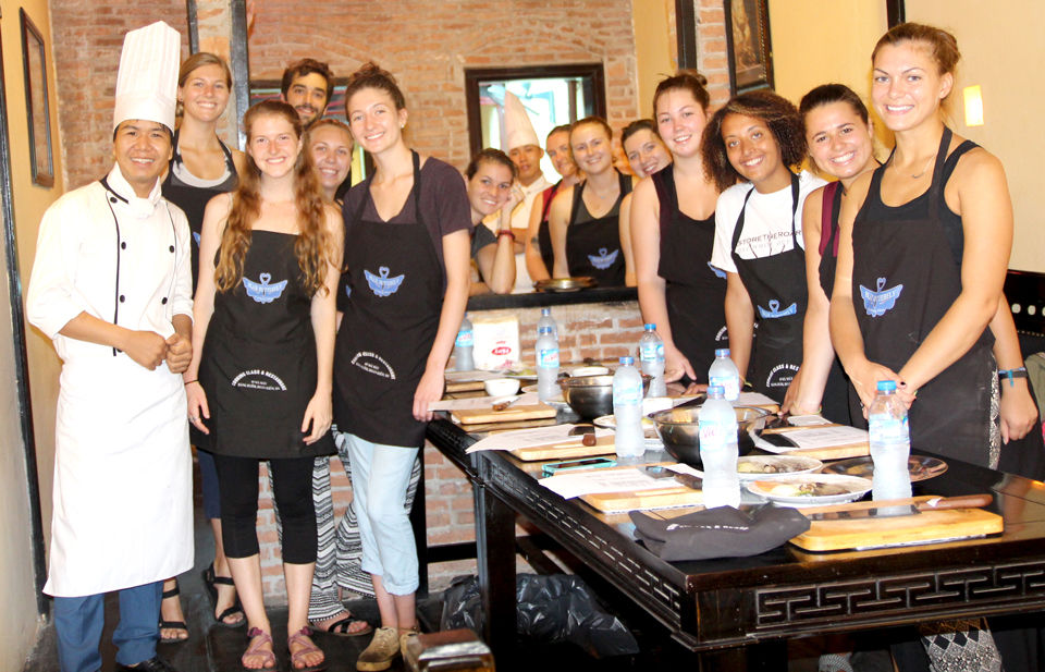 Interactive Vietnamese Cooking Class with Cyclo Tour and Market Tour