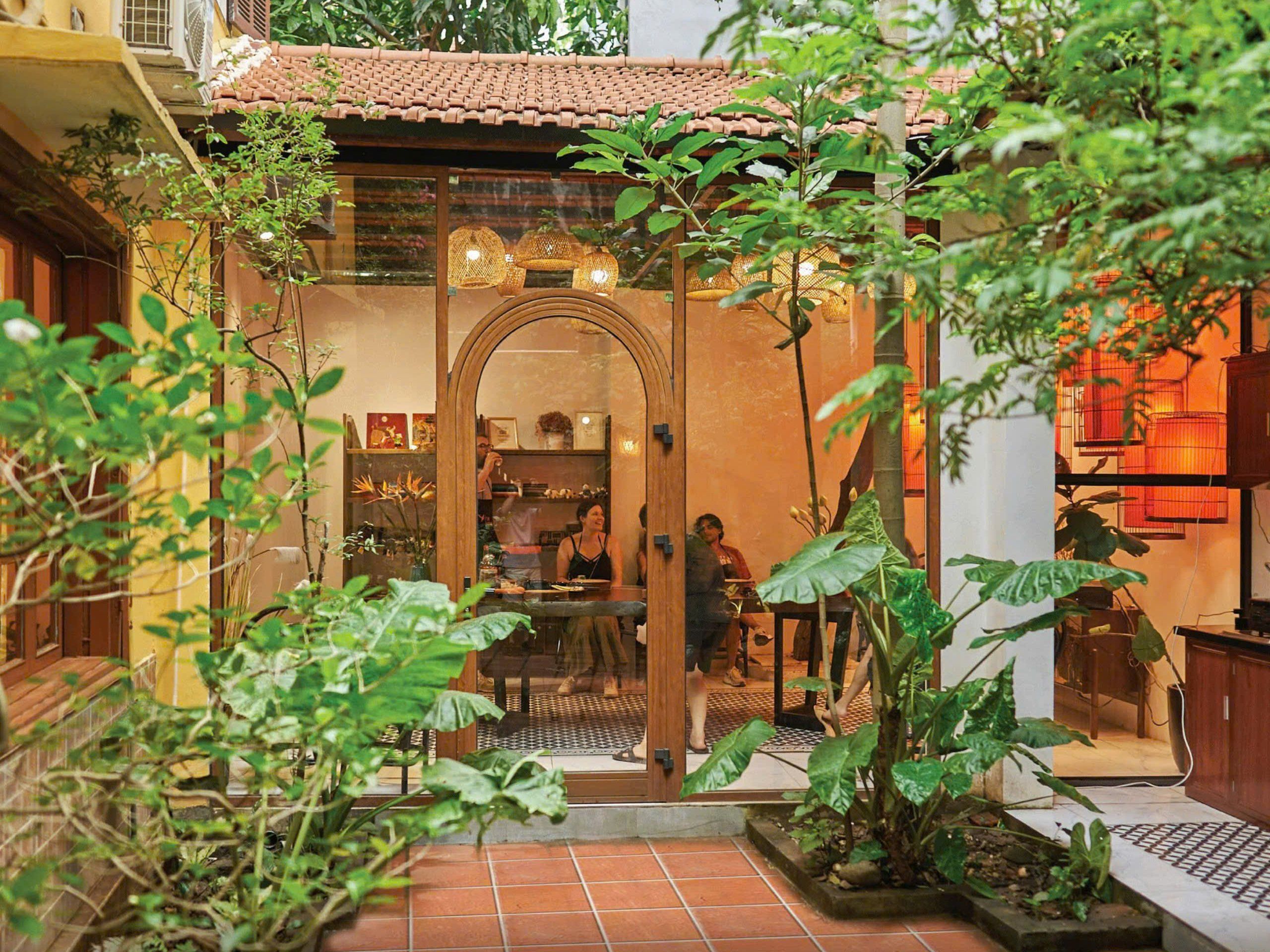 Cultural Food Journey in Tranquil Garden Villa with Market Tour