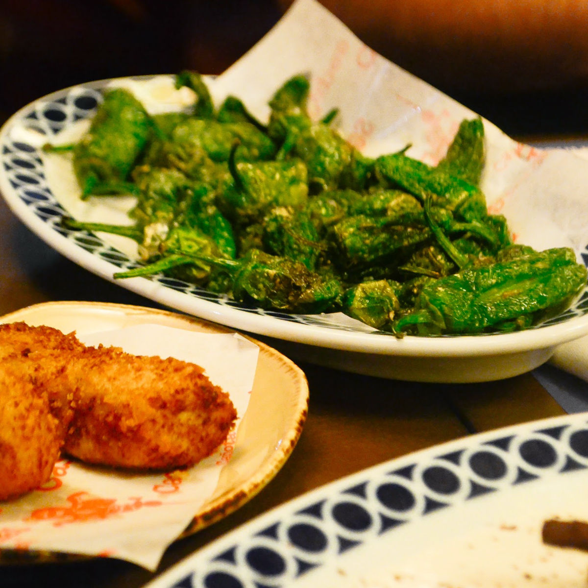 Barcelona Night Bike Tour with Local Tapas and Cava Stop
