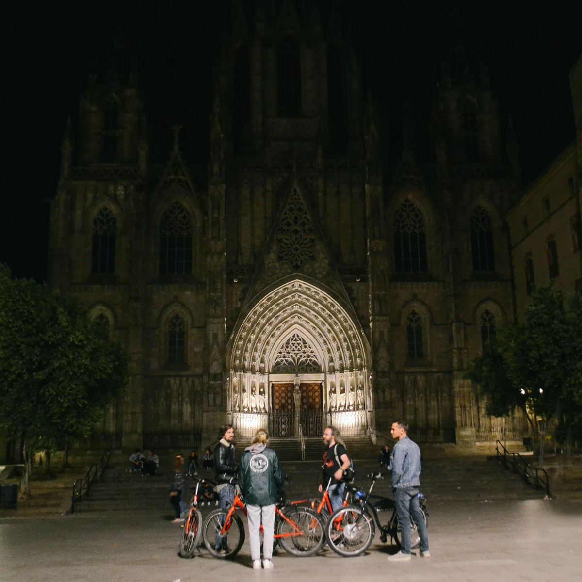 Barcelona Night Bike Tour with Local Tapas and Cava Stop