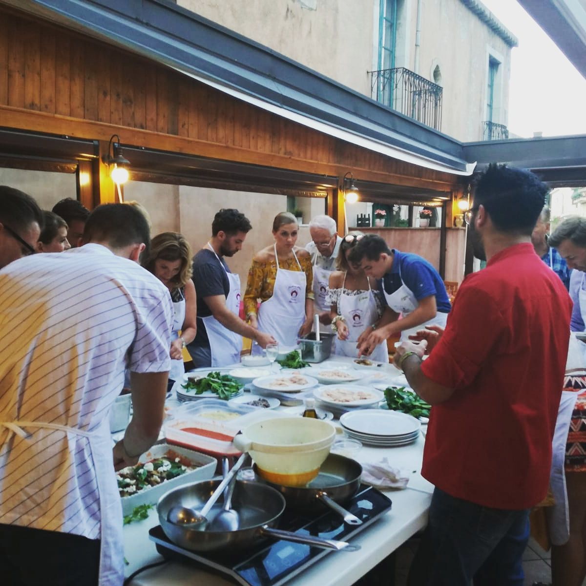 Italian Cooking Class with "Rionale" Market Tour in Taormina