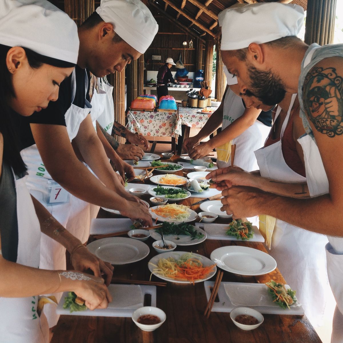Eco-Friendly Vietnamese Cooking Class with Bamboo Boat and Market Tour