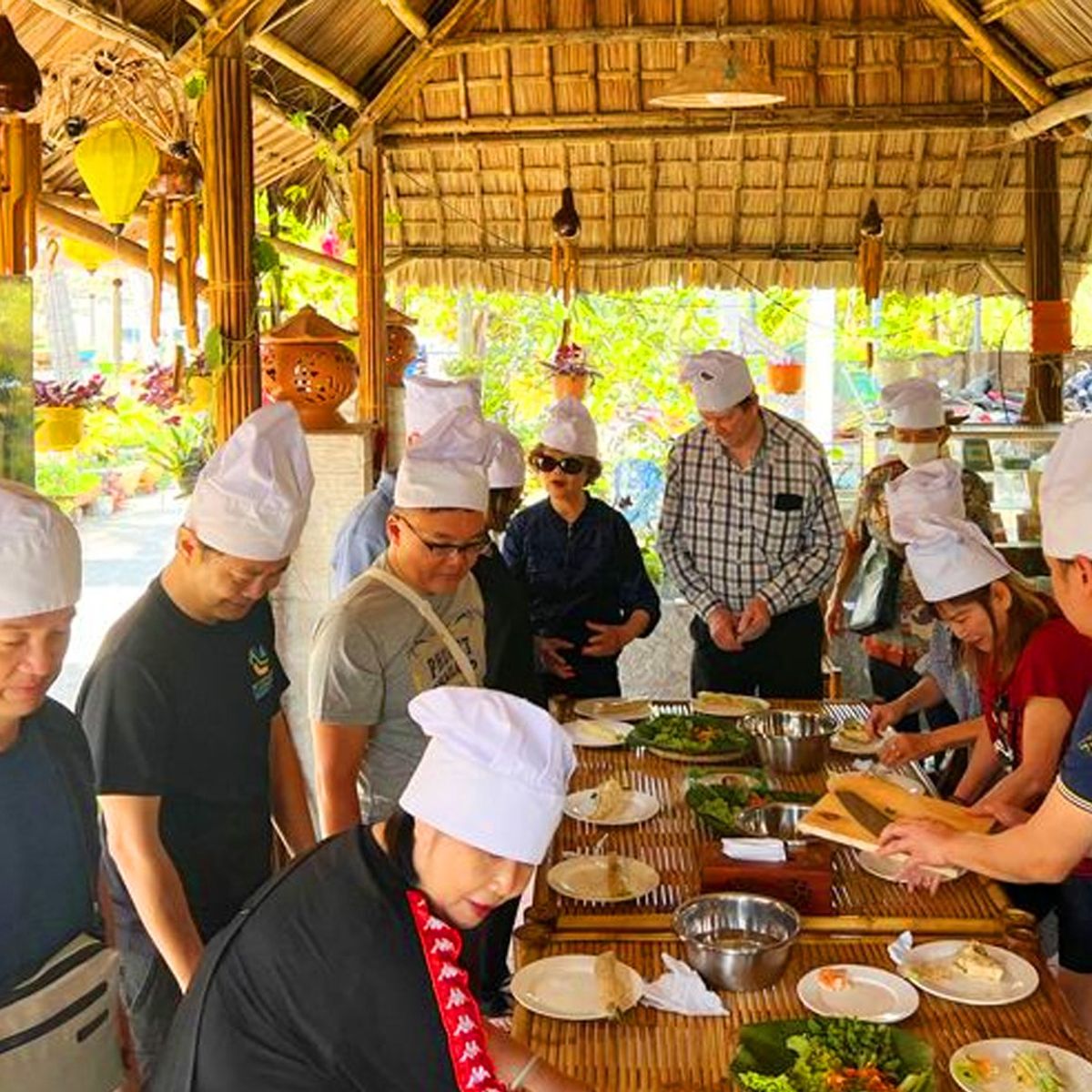 Vietnamese Countryside Experience: Market Tour, Basket Boat Ride, and Cooking Class