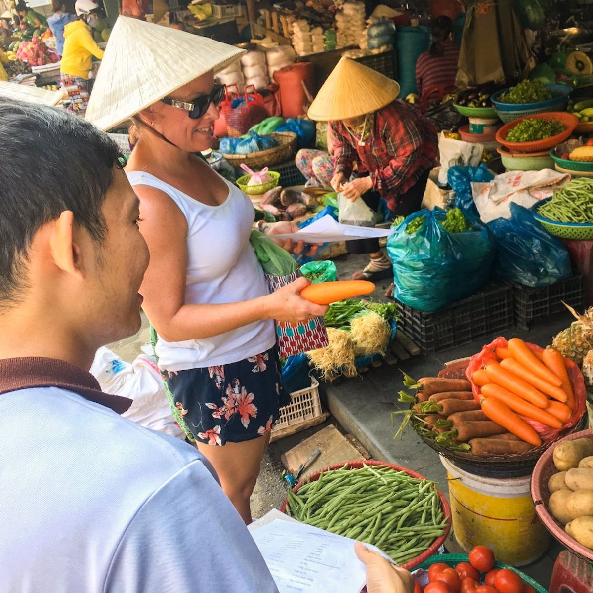 Vietnamese Countryside Experience: Market Tour, Basket Boat Ride, and Cooking Class