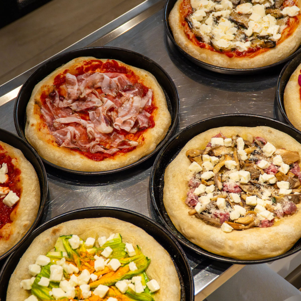 Italian Classics Cooking Class in Piazza Mattei: Pizza, Pasta & Tiramisu