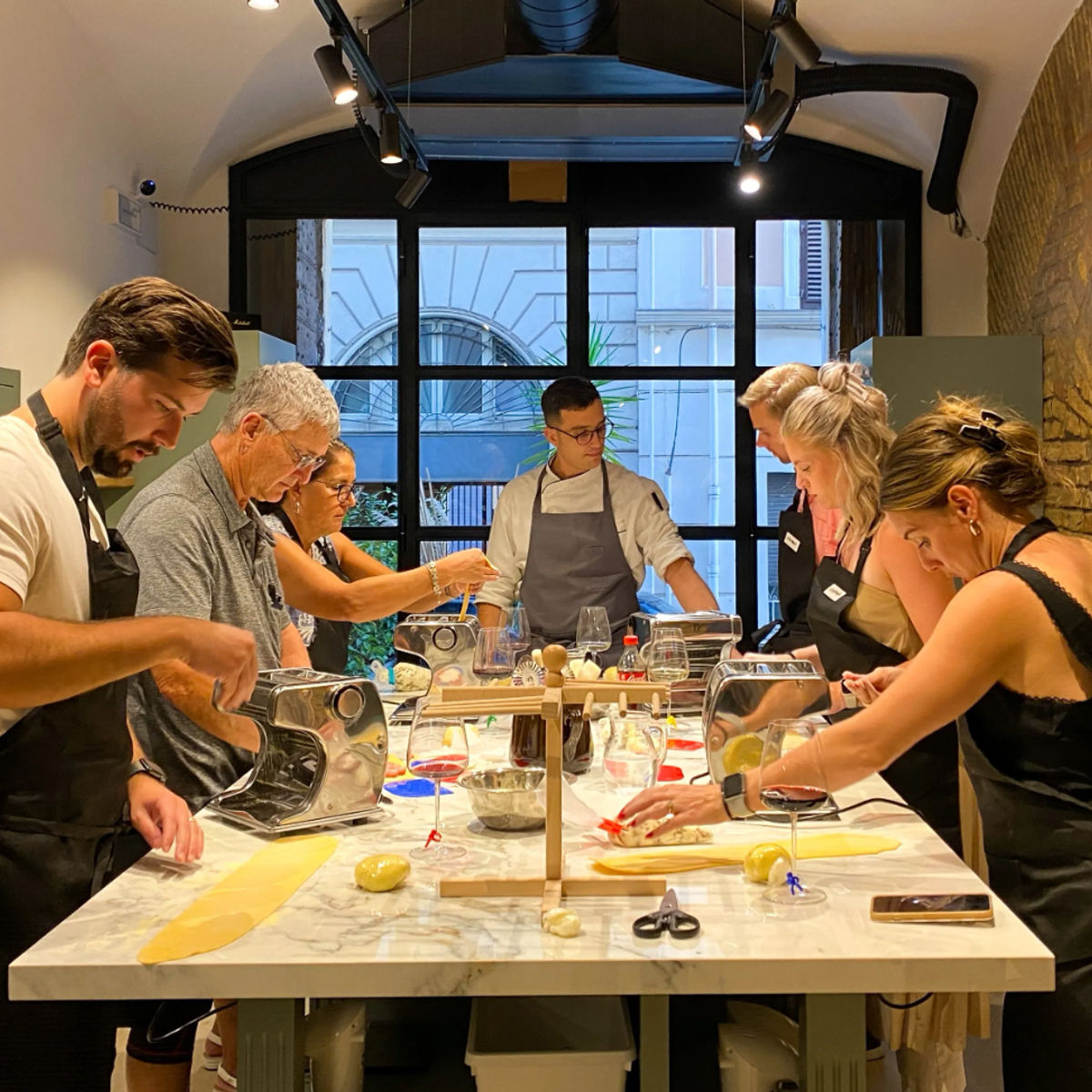 Italian Cooking Masterclass by the Colosseum: Pizza, Pasta & Tiramisu with Wine