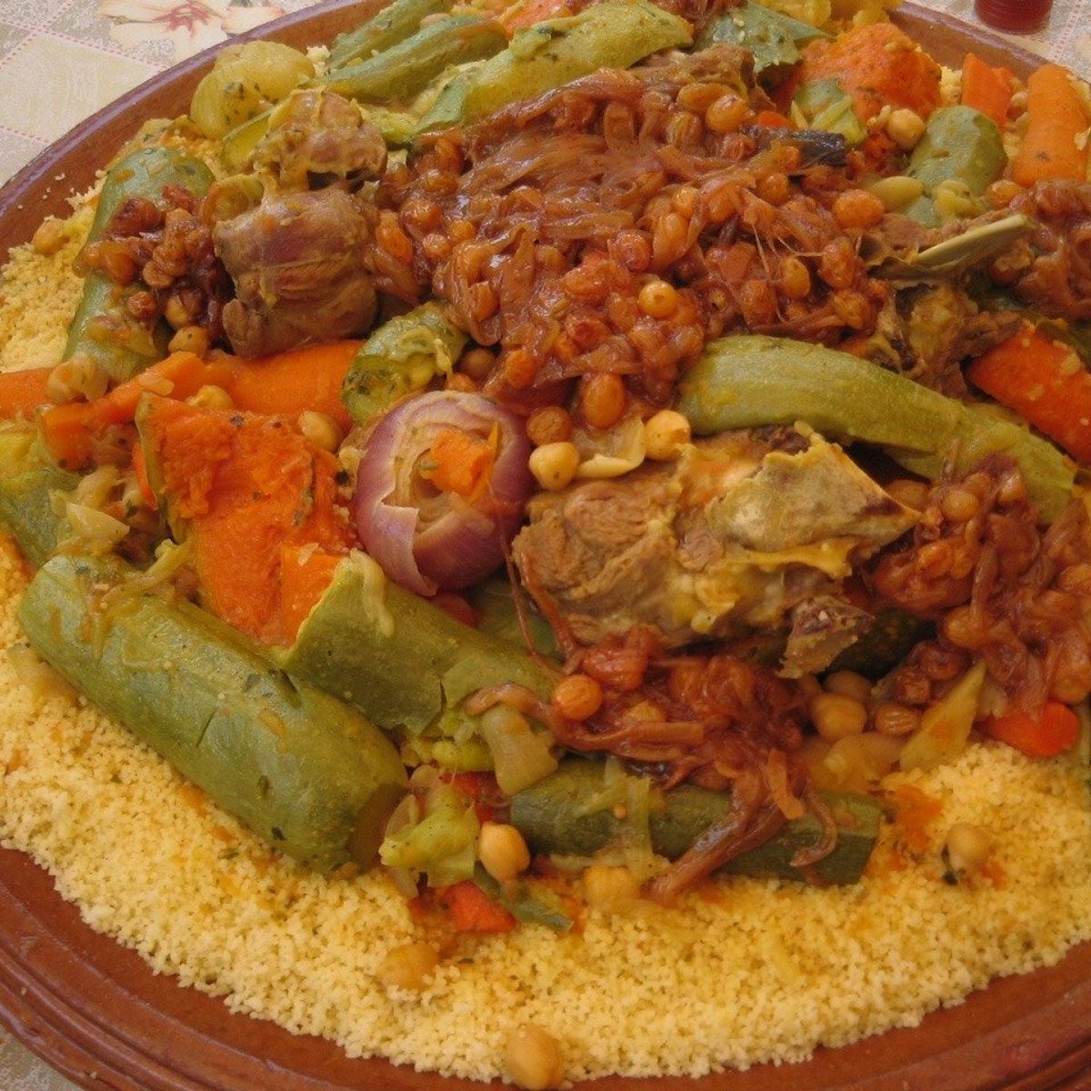 Discover Moroccan Cuisine: Traditional Couscous and Local Souk Tour