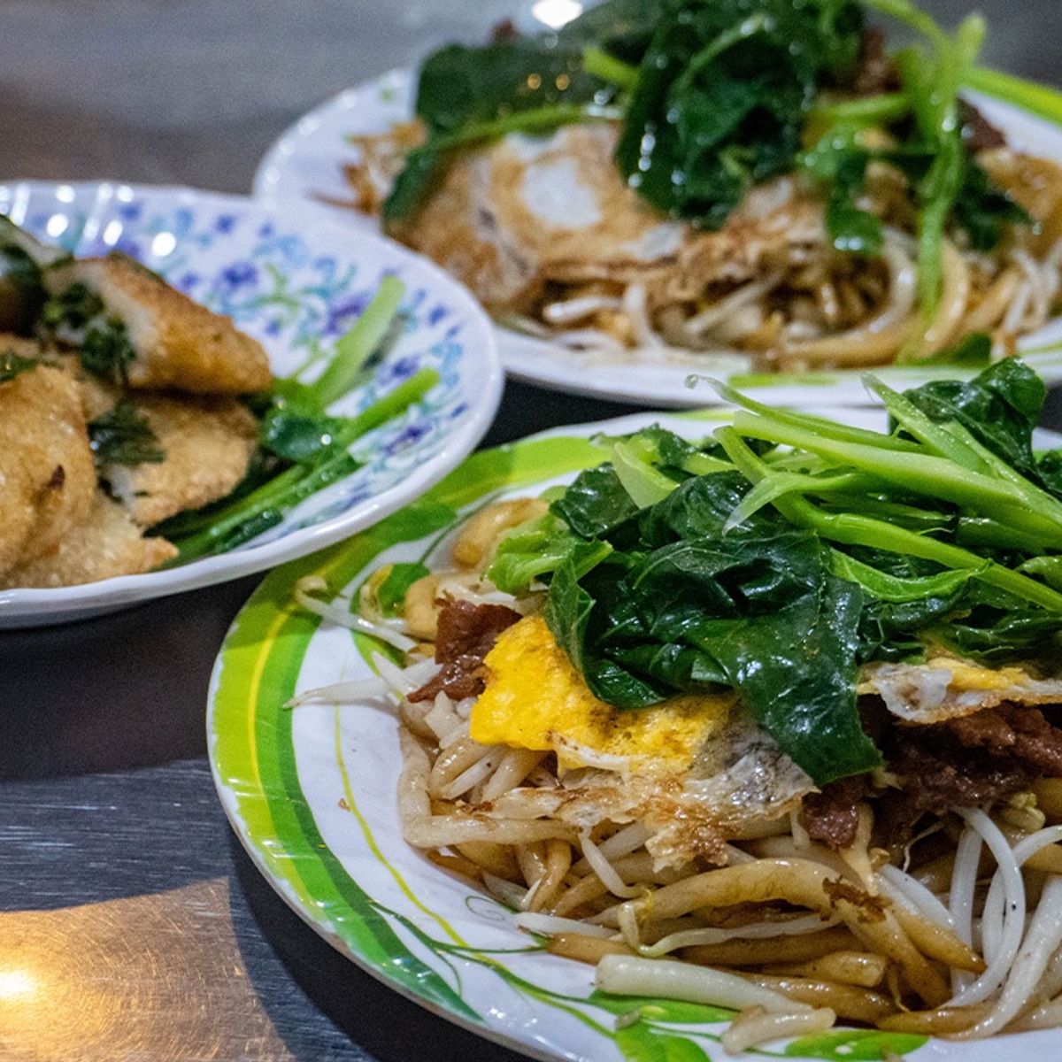Evening Vespa Street Food Adventure in Phnom Penh