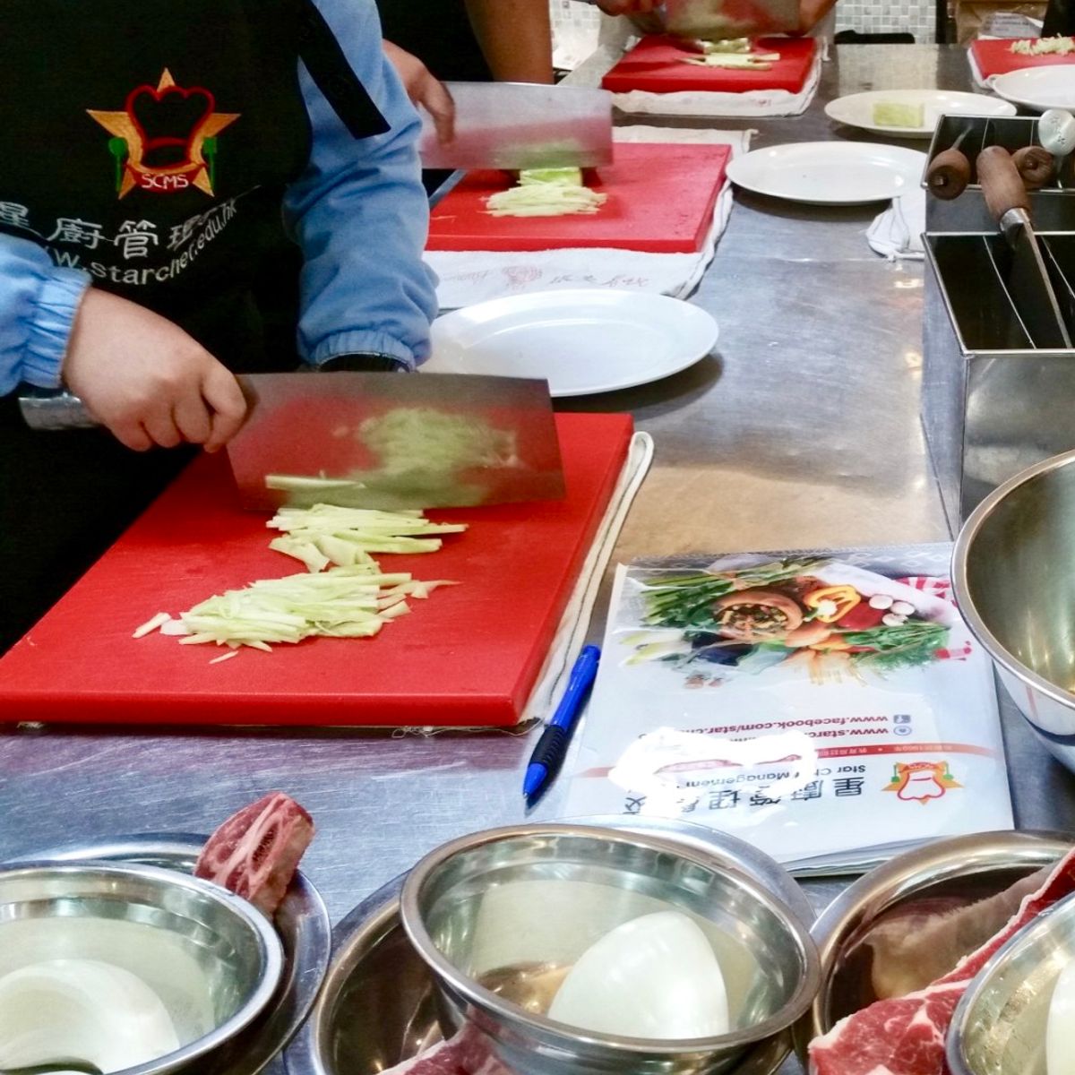 Cours privé de cuisine chinoise au wok avec un chef professionnel