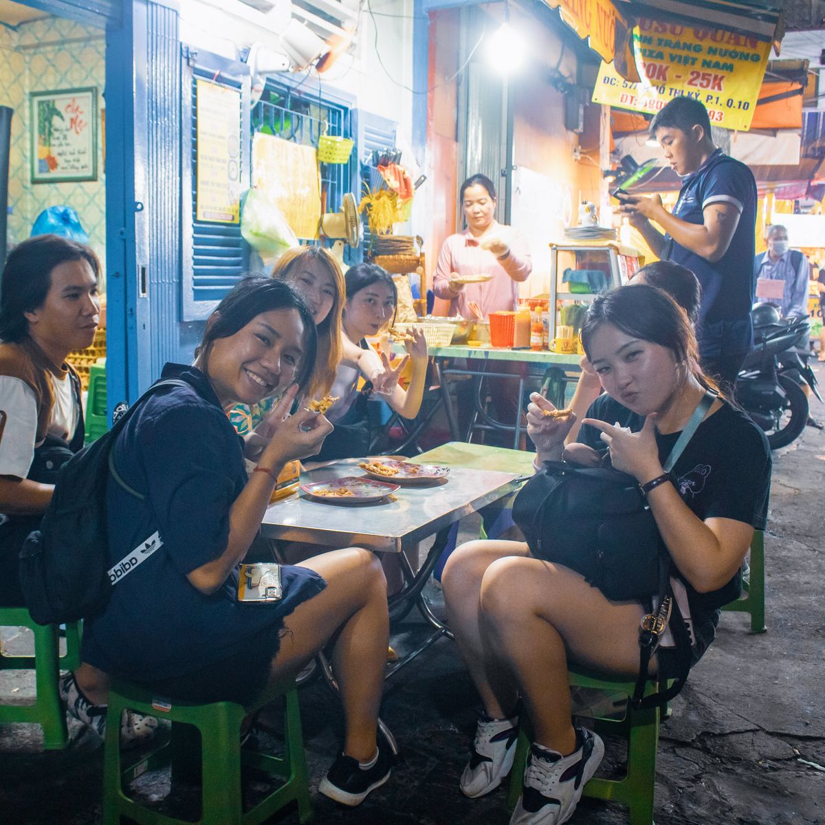 An Evening Saigon Street Food Experience by Scooter