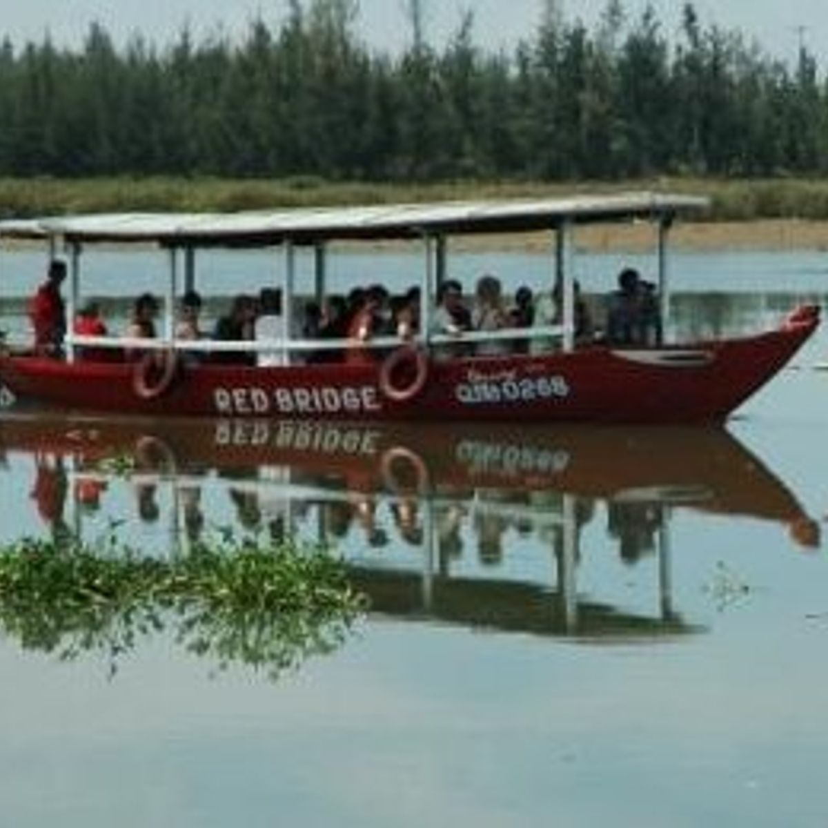 Red Bridge Deluxe Day Journey: Organic Farm, Boat Trip, Market Tour and Hands on Cooking of 4 Famous Vietnamese Dishes