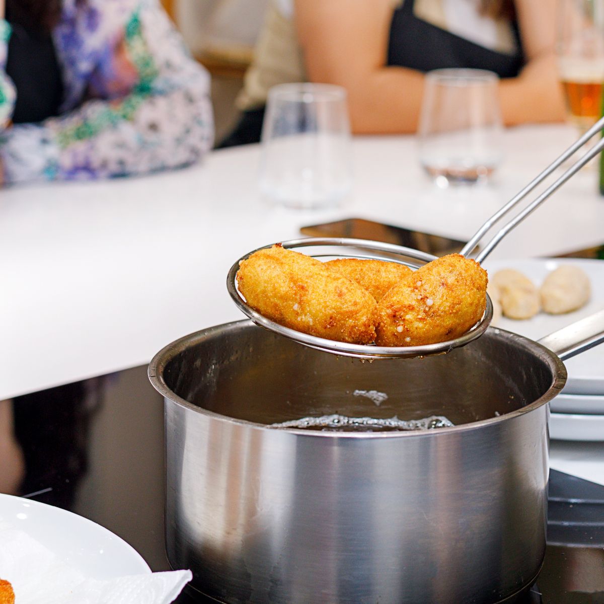Tapas and Paella Culinary Class in a Special Gastronomic Place
