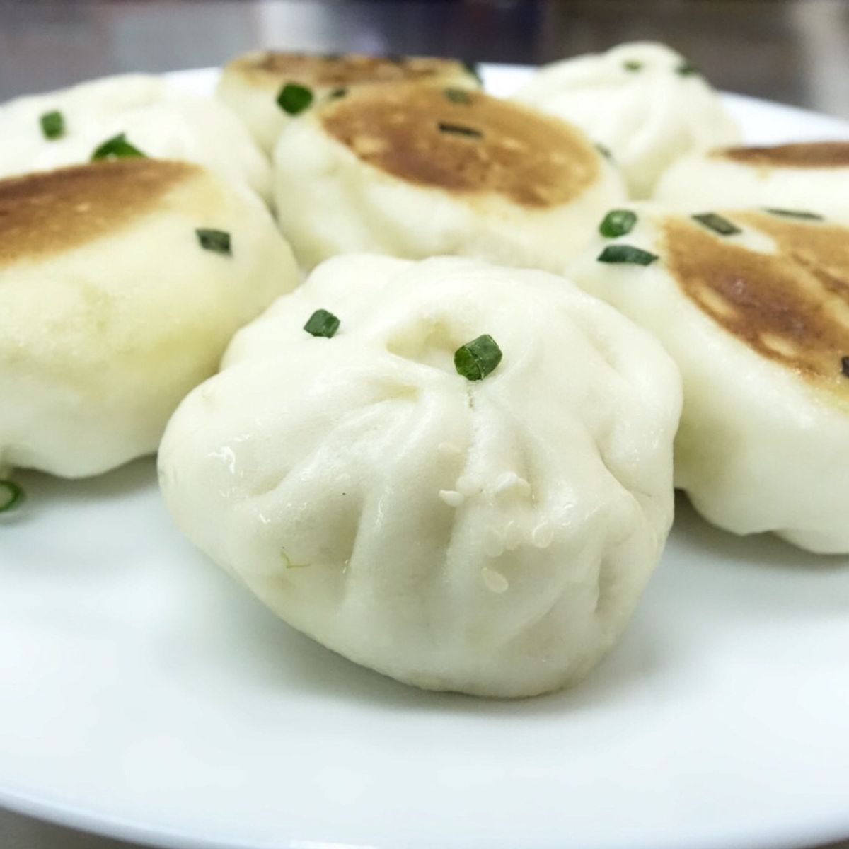 Traditional Chinese Steamed Bun with Pork Fillings and Homemade Barbeque Pork