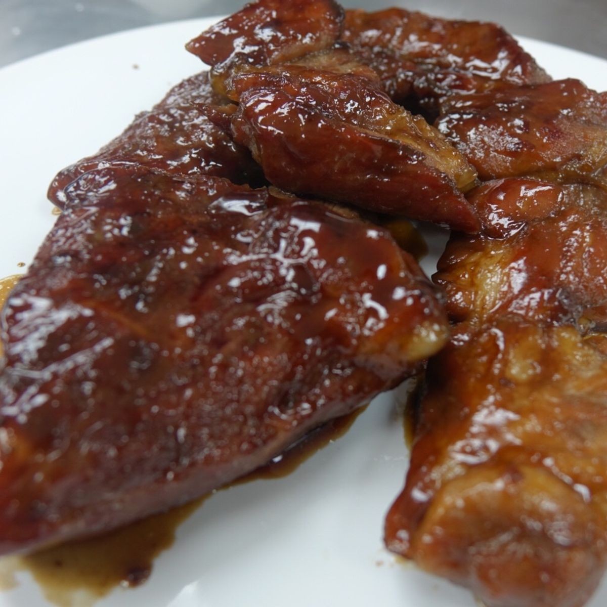 Traditional Chinese Steamed Bun with Pork Fillings and Homemade Barbeque Pork