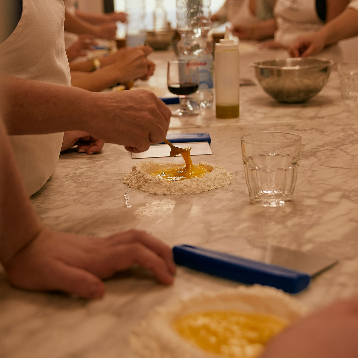 Tuscan Market Tour with Pasta Class, Tiramisu, and Wine Tasting