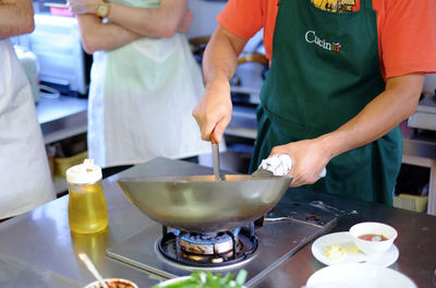 Cook with the Chef: Wok Skills and Stir Fry Class with Market Tour and Condiments class