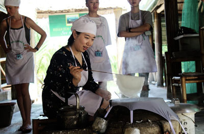 Eco-Friendly Vietnamese Cooking Class with Bamboo Boat and Market Tour