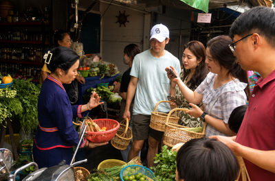 Explore a Morning Market and Cook Classic Thai Dishes in Silom
