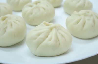 Traditional Chinese Steamed Bun with Pork Fillings and Homemade Barbeque Pork