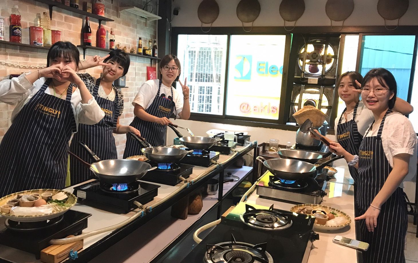 Explore a Morning Market and Cook Classic Thai Dishes in Silom