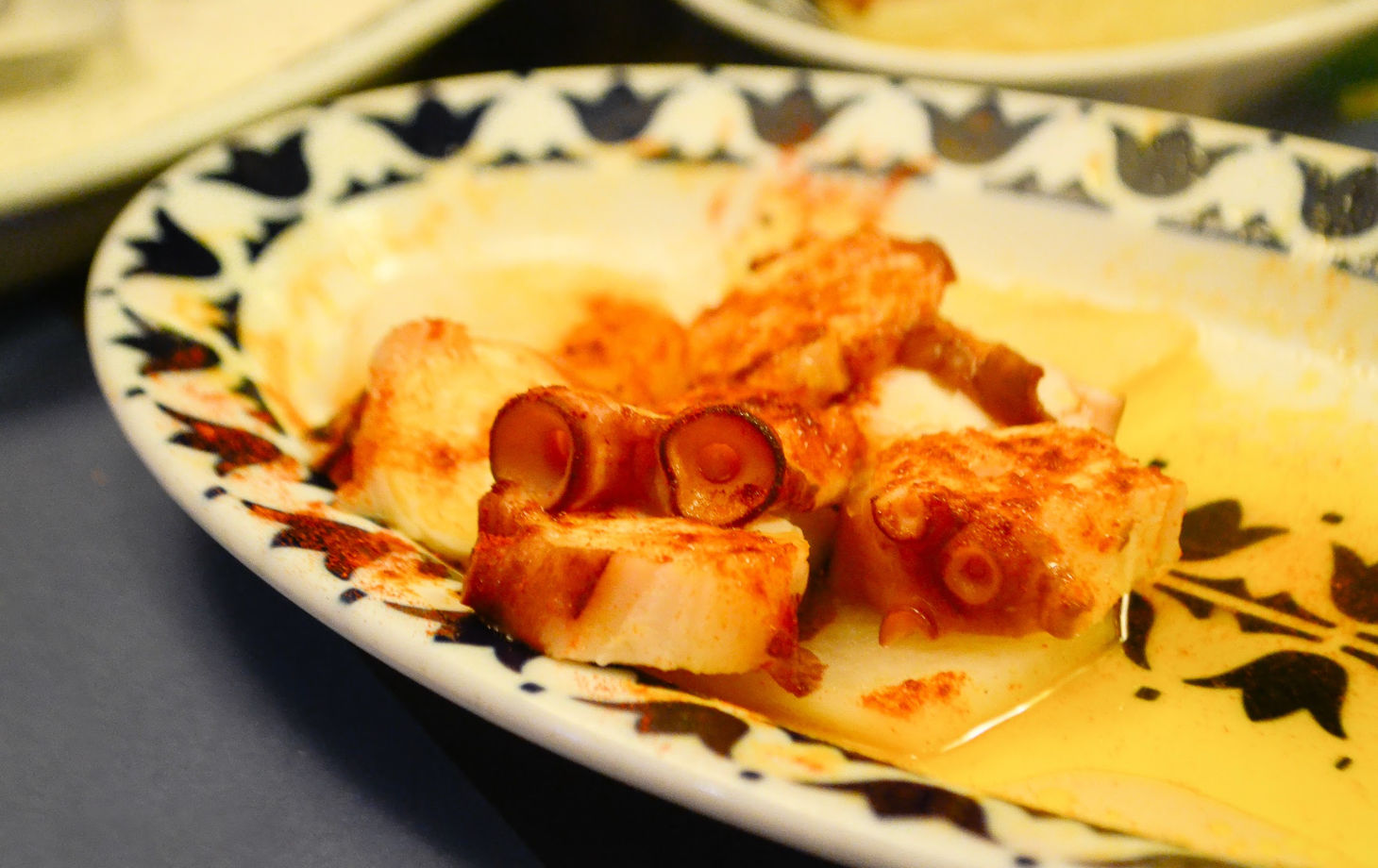 Barcelona Night Bike Tour with Local Tapas and Cava Stop